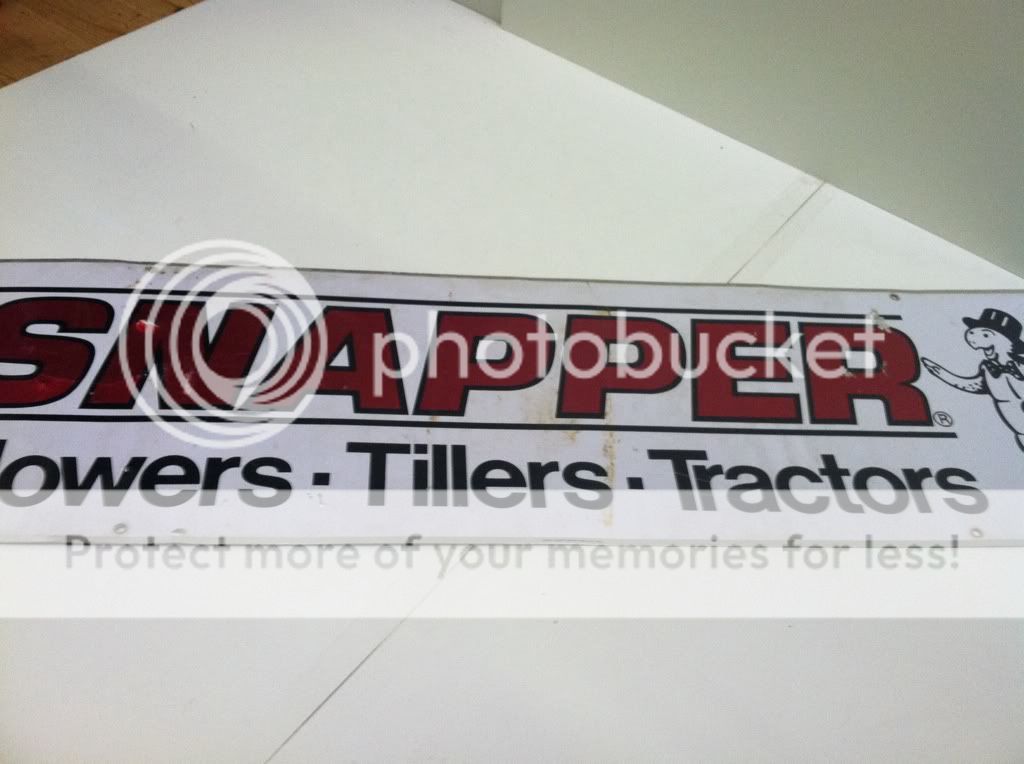 This sign is an antique Snapper Mower, Tiller and Tractor Sign. This 